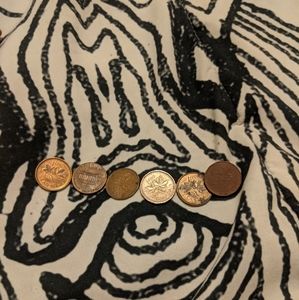 Six very well conditioned pennies